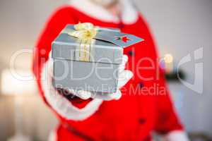 Santa claus giving a gift