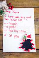 A letter to santa on wooden table