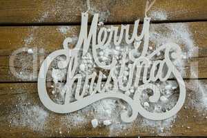 Merry Christmas text with artificial snow