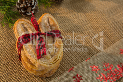 Close up of baked food tied with ribbon