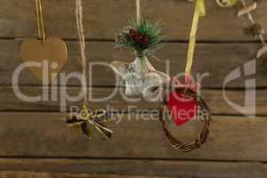 High angle view of Christmas decorations with thread