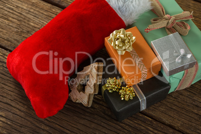 High angle view of Christmas presents with stocking