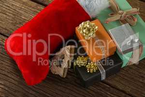 High angle view of Christmas presents with stocking
