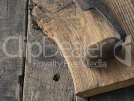 Old wood plane on oak plank