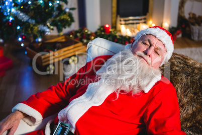 Santa Claus sleeping on couch