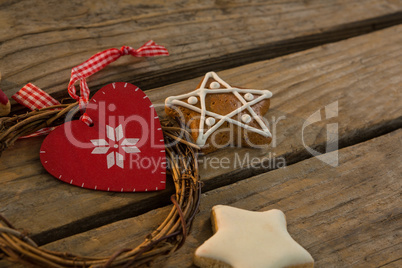 Close up of gingerbread cookies with Christmas decoration on table