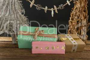 Close up of gift boxes with Christmas decoration on table