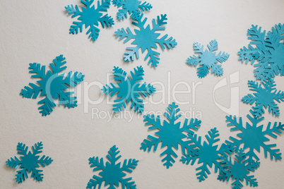 Blue snowflakes on white background