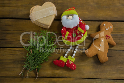 Overhead view of santa claus by twigs gingerbread man