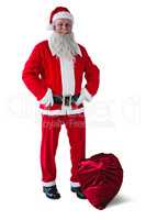 Santa Claus standing with christmas bag