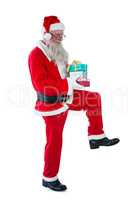 Santa Claus holding gift boxes