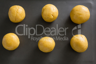 Dough balls on cooking tray