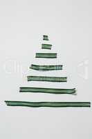 Green ribbons arranged in white background