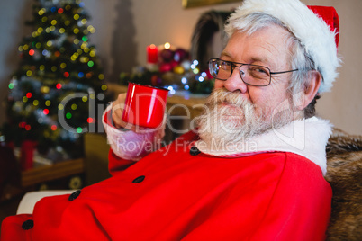 Santa Claus having coffee