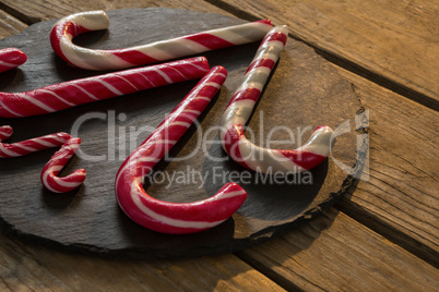 Close up of candy canes on wood