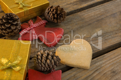 High angle view of pine cones with gift boxes