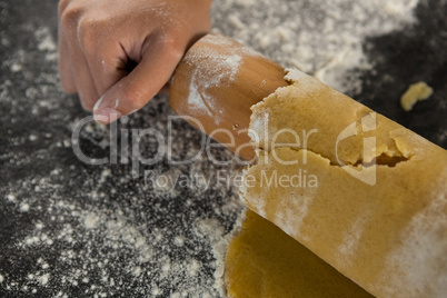 Hand baking dough with rolling pin