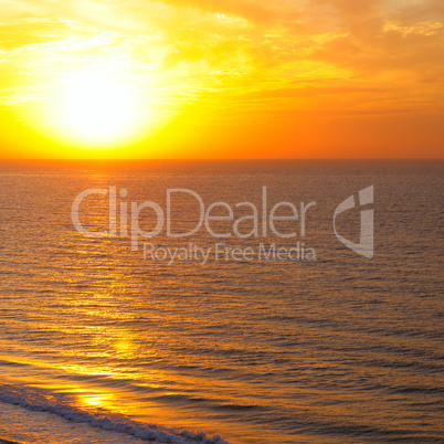 Bright sunrise over ocean