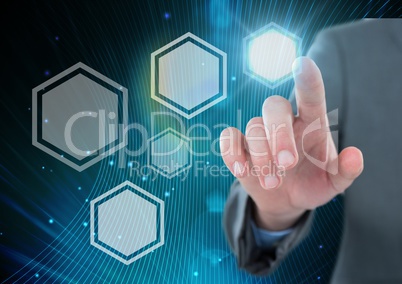 Hand touching icons interface of hexagons glowing