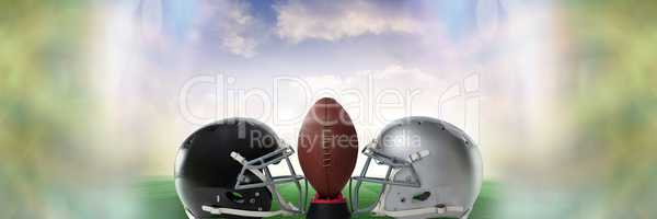 American football versus team helmets with ball with sky transition