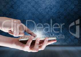Hand touching tablet with glow