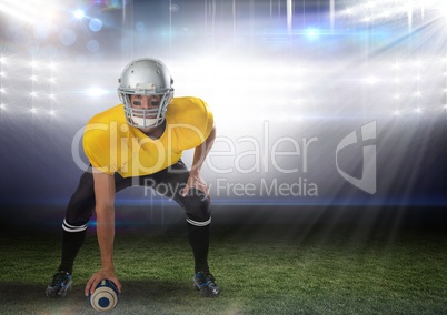 american football  player standing in stadium starting game