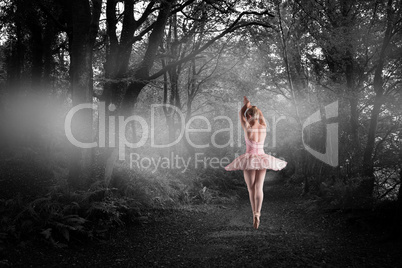 Composite image of ballerina standing en pointe