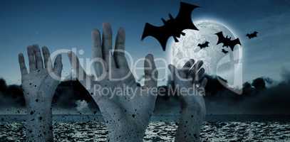 Digital image of bats flying over cropped hands