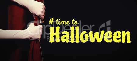 Composite image of digital image of time to halloween text
