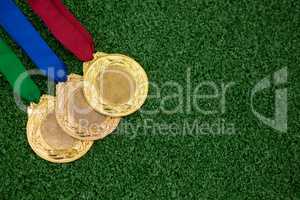 Medals on artificial grass