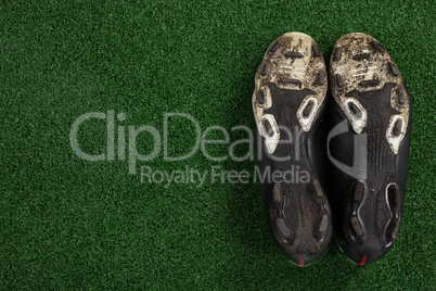 Cleats kept upside down on artificial grass