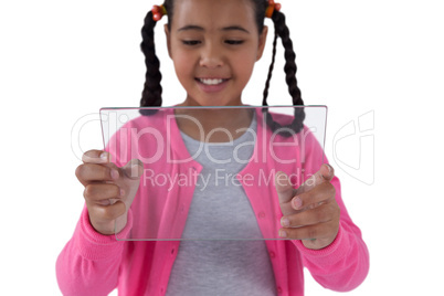 Girl using glass digital tablet