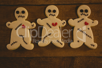 Close up of Halloween cookies arranged on wooden table