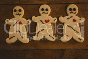 Close up of Halloween cookies arranged on wooden table