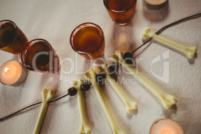 High angle view of drinks with candles with decoration