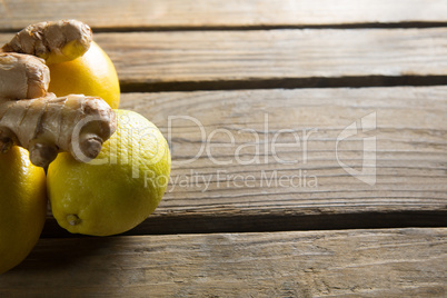 Close up of lemons and ginger on table
