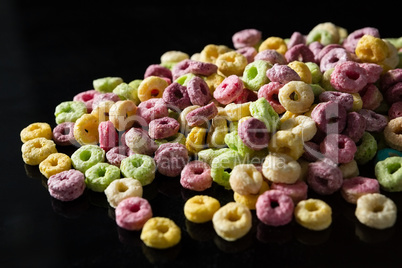 Froot loops on black background