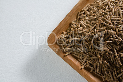 Cereal bran sticks in wooden bowl
