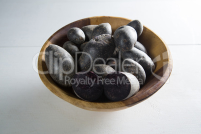 Sweet potatoes in bowl on table