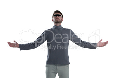 Man gesturing while using virtual reality glasses