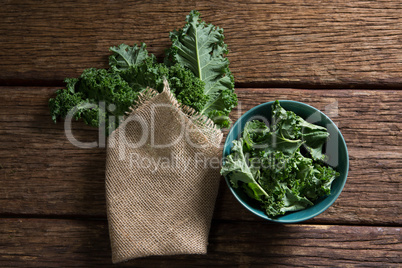 Mustard greens on wooden table