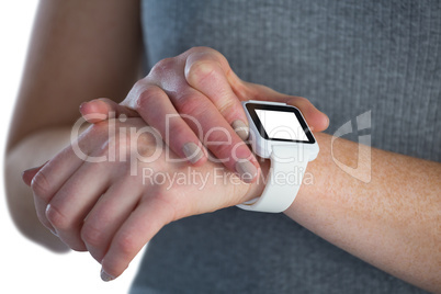 Close up of businesswoman adjusting smart watch