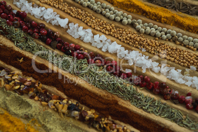 Various spices arranged in row