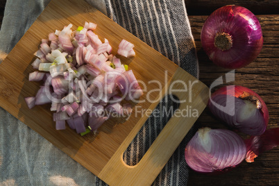 Chopped onion on chopping board
