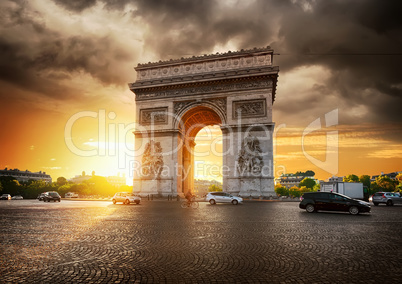 Cloudy sky and Arc de Triomphe