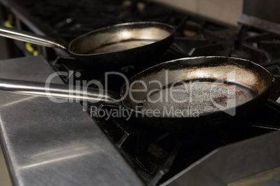 Empty pan on gas stove
