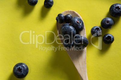 Blueberries in yellow plate
