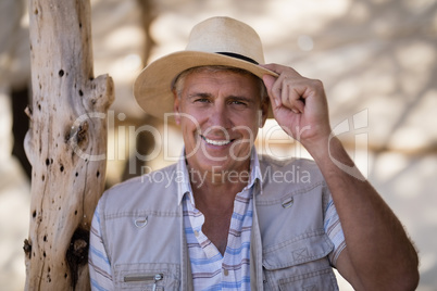 Portrait of happy man wearing hat