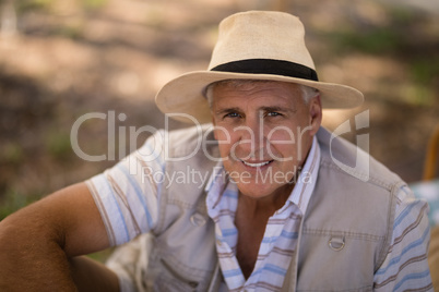 Portrait of happy man wearing hat