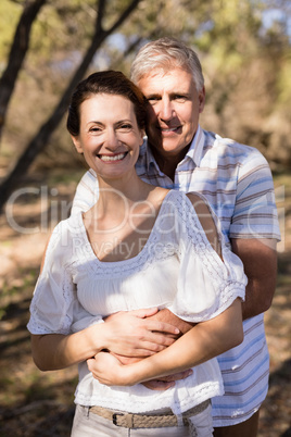 Portrait of romantic couple embracing each other